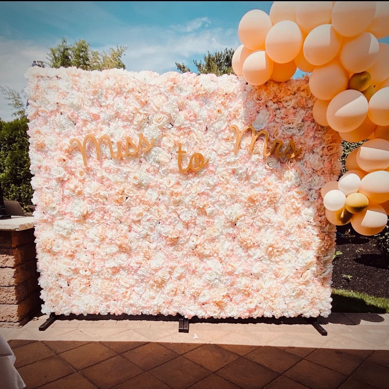 Miss to Mrs floral wall with balloons